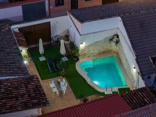 an overhead view of a swimming pool in a house at Casa Los Templarios, Puy du fou Toledo in Burujón