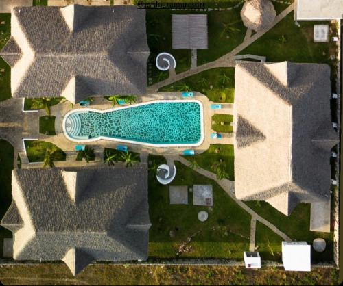 an overhead view of a swimming pool in a house at Cacuki Boutique House in Watamu