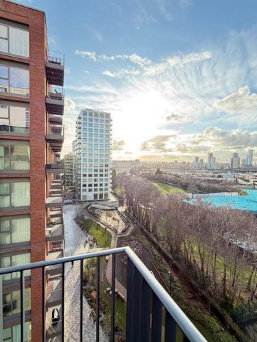 a view of a river from a balcony of a building at Silver Apartments ExCel in London