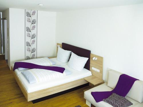 Postel nebo postele na pokoji v ubytování Hotel Anker