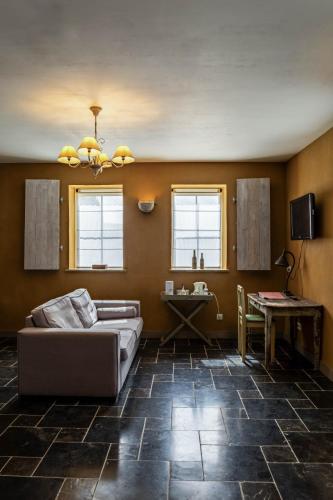 พื้นที่นั่งเล่นของ B&B Kamer en Aambeeld