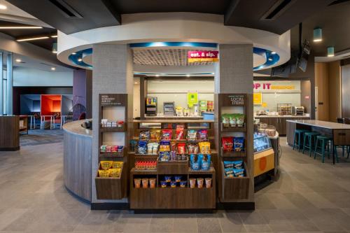 a grocery store with a display of food at Tru By Hilton Columbia South in Columbia