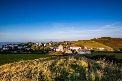 a small town on top of a hill at The Smugglers Rest in Woolacombe