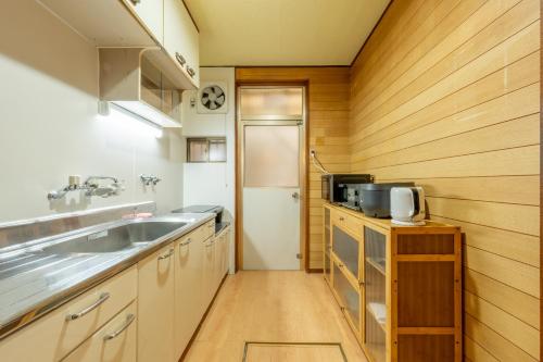 7BR Entire 2-House Rental Sleeps 12 Theater and Games Umeda 3 Min