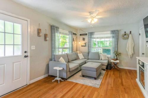 a living room with a couch and a ceiling fan at Copper Voyage, Fenced Backyard in Coeur d'Alene