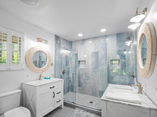 a bathroom with a shower and a toilet and a sink at Sheltered Cove - Family-Friendly With Lots Of Options! in Jasper