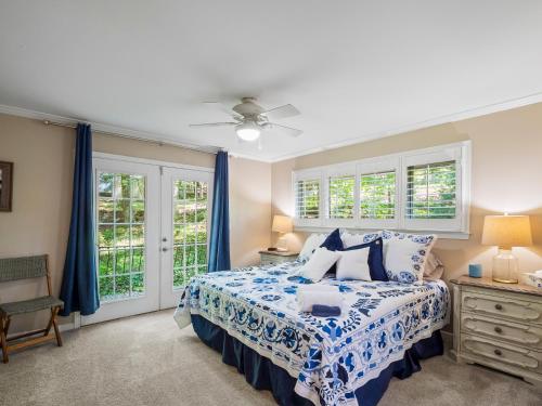 a bedroom with a bed and a ceiling fan at Sheltered Cove - Family-Friendly With Lots Of Options! in Jasper