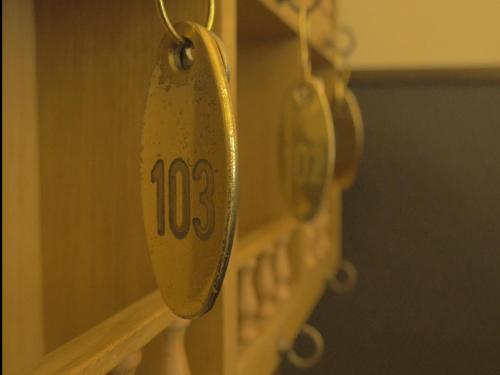 a rear view mirror with the number on it at Hotel Medici in Milazzo