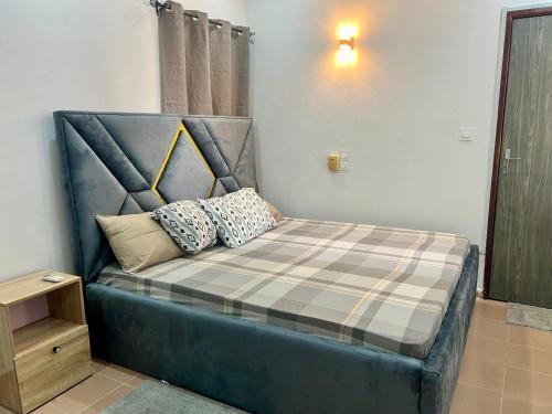 Llit o llits en una habitació de Résidence Glomito