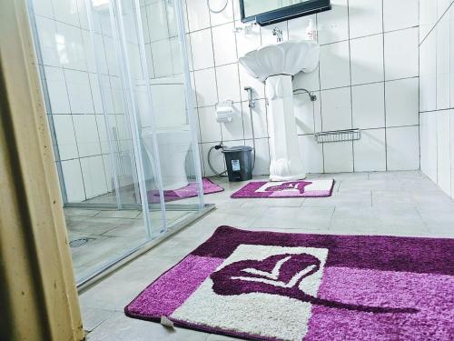 Koupelna v ubytování Ifè Home