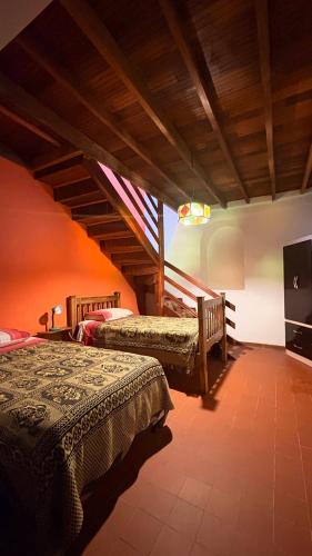 Llit o llits en una habitació de The Baron House