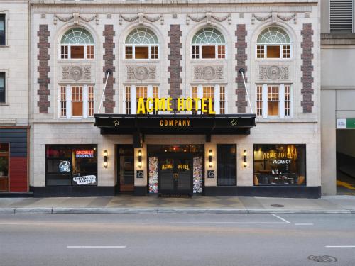 a store front of a building on a city street at ACME Hotel Chicago, Outset Collection by Hilton in Chicago