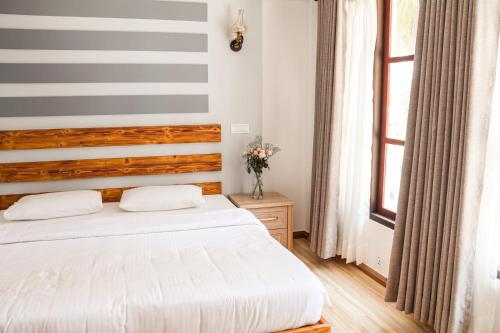 เตียงในห้องที่ Hello Ocean View