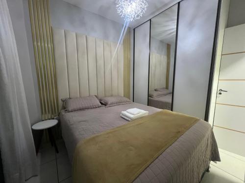 เตียงในห้องที่ Casa Maia Eusébio