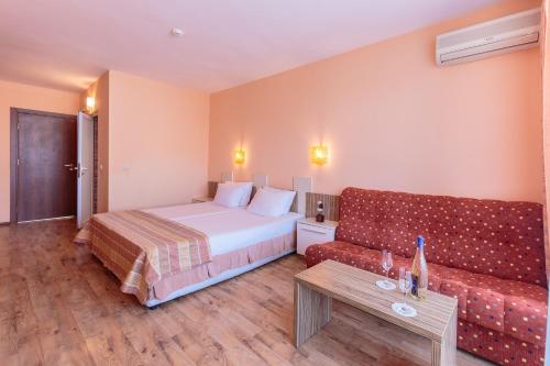 Postel nebo postele na pokoji v ubytování Hotel Apolis