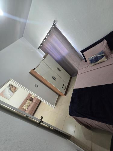 an overhead view of a bedroom with a bed at Candy House Marsella in Sitio Grande