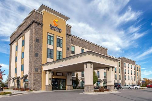a building with a sign on the front of it at Comfort Inn & Suites Salt Lake City Airport in Salt Lake City