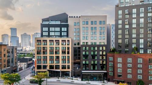 a group of tall buildings in a city at Homewood Suites By Hilton Nashville Downtown The Gulch in Nashville