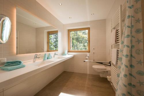 Kúpeľňa v ubytovaní Appartements Rofan