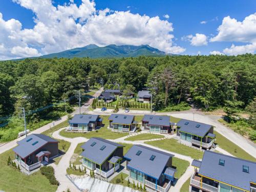 an aerial view of a home with houses at YATSUGATAKE KOGEN RESORT in Hokuto