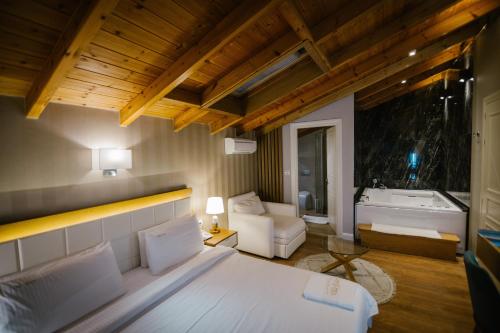 Tempat tidur dalam kamar di Villa Ester