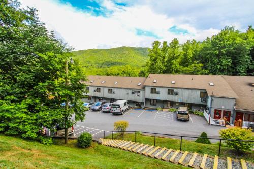 an aerial view of a building with a parking lot at Smoketree Lodge in Banner Elk