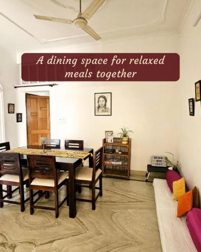 a dining space with a table and chairs at Ashiana By Ijabojyu- Pet friendly Homestay in Dehradun
