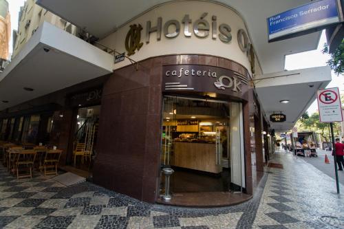 a store front of a building with a restaurant at Hotel OK in Rio de Janeiro