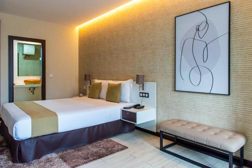 Postel nebo postele na pokoji v ubytování Maculusso Boutique Hotel