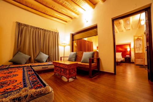 a hotel room with a bed and a mirror at Royal Soma Resort in Stak