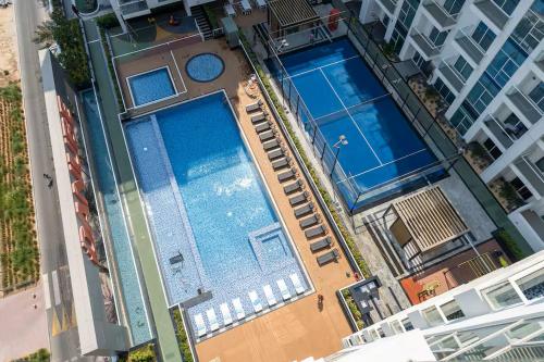 Vogue Vacation Homes, Al Furjan Pearlz by Danube near Ibn Battuta Mall, One Bedroom Apartment with Terrace and vibrant community view, Access to all Amenities, Walkable to Al Furjan Metro Station