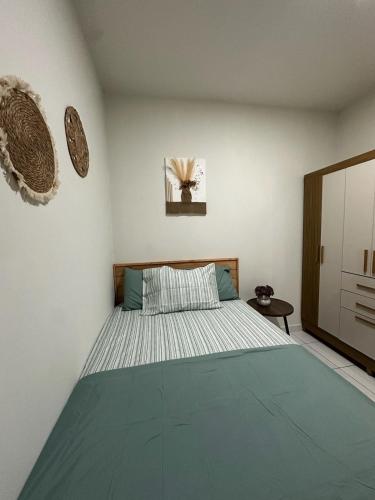 a bedroom with a large bed in a room at Apartment D Fuertevali in San Salvador