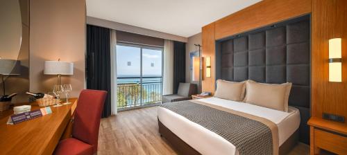 Postel nebo postele na pokoji v ubytování Gravel Select Hotel - Ultra All Inclusive