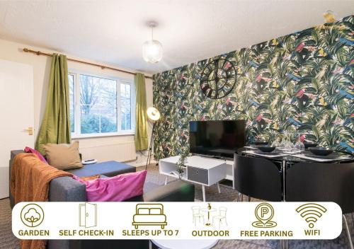 a living room with a tv and a couch at 3-Bed House in Coventry with Free Parking & Private Garden By Sublime Stays in Parkside