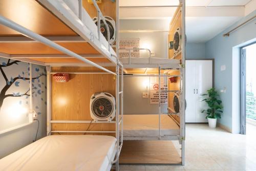 a room with a bunk bed in a room at Lola's House in Ha Long
