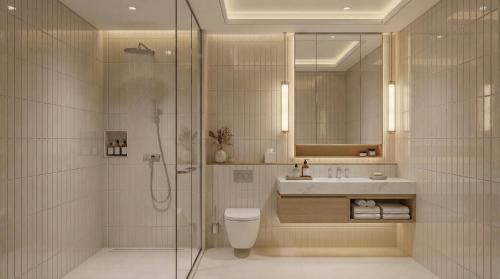 a bathroom with a shower and a toilet and a sink at The Bristol Bol - NEW IN 2026 in Bol