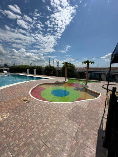 a view of a swimming pool with a sky at Casa Los Mangos 4 Piscinas 6 Camas y mucho Sol in Flandes