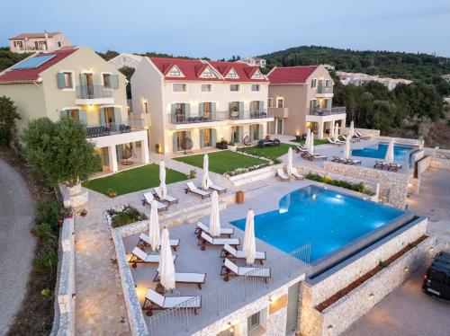 an aerial view of a villa with a swimming pool at Hellosummer Boutique suites,near fiscardo! in Andipáta Erísou