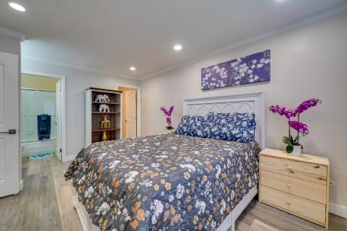 a bedroom with a king sized bed and a dresser at Pleasanton Gem in Quiet Community w/ Pool Access in Pleasanton