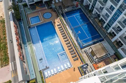 Vogue Vacation Homes, Al Furjan Pearlz by Danube near Ibn Battuta Mall, One Bedroom Apartment with Balcony and Pool View, Access to all Amenities, Walkable to Al Furjan Metro Station
