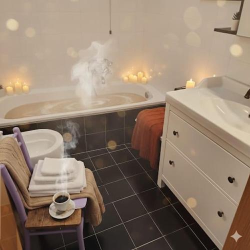 a bathroom with a tub and a toilet and a sink at La Dimora Dei Cimini in Caprarola