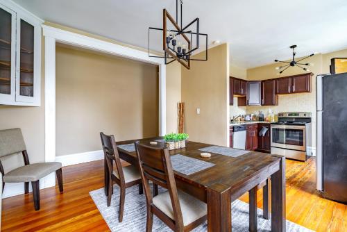 a kitchen and dining room with a table and chairs at The Parkside by Jungle House - Short North Boutique Suites in Columbus