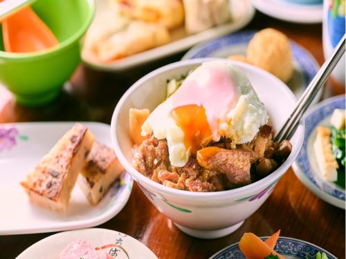 a bowl of food sitting on top of a table at APA Hotel Kodemmacho Ekimae in Tokyo