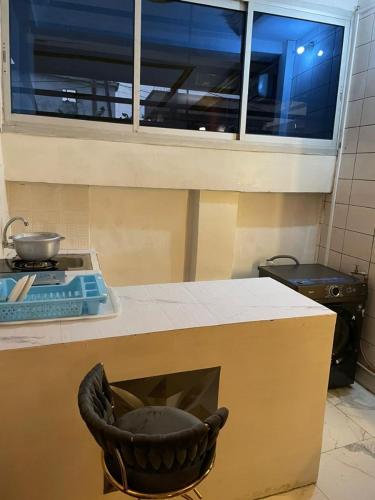 Virtuvė arba virtuvėlė apgyvendinimo įstaigoje Le Petit Cocon