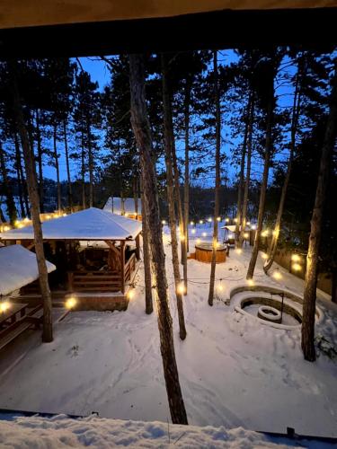 a winter night with a tent in the snow at BoHome Balaton in Balatonakali