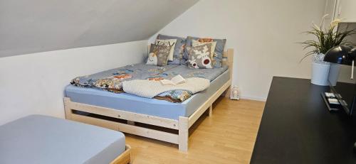 a bedroom with a bed in a room at Sielskie Sitno in Sitno