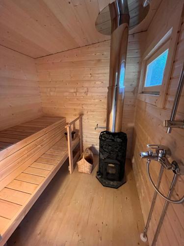 an inside view of a wooden cabin with two bunk beds at Cozy big villa in Hanko in Hanko