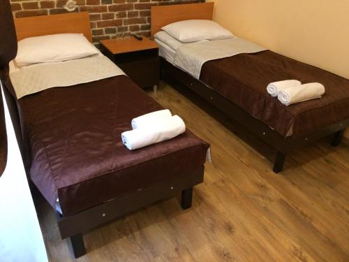 Postel nebo postele na pokoji v ubytování TsisaR Bankir Hotel