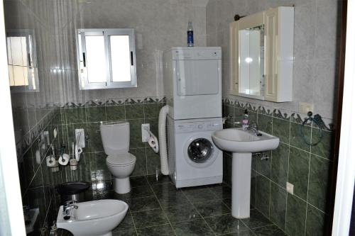 Ett badrum på Hostal la Encina