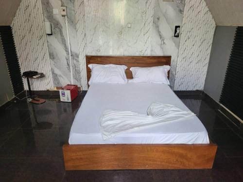 Ліжко або ліжка в номері Canon Beach